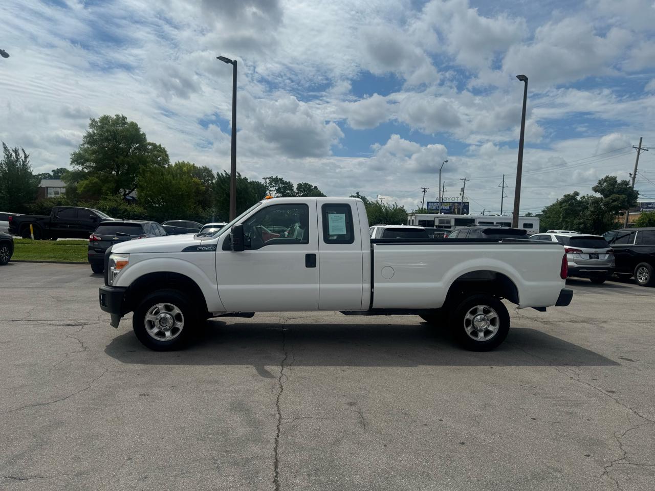 Ford Super Duty F-250 SRW 4WD SuperCab 142" Lariat 2014