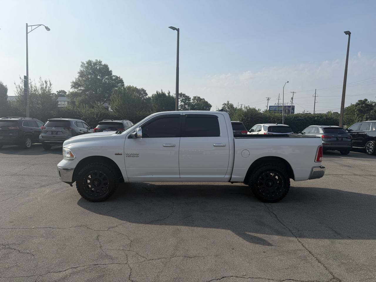 RAM 1500 4WD Crew Cab 140.5" Laramie 2014