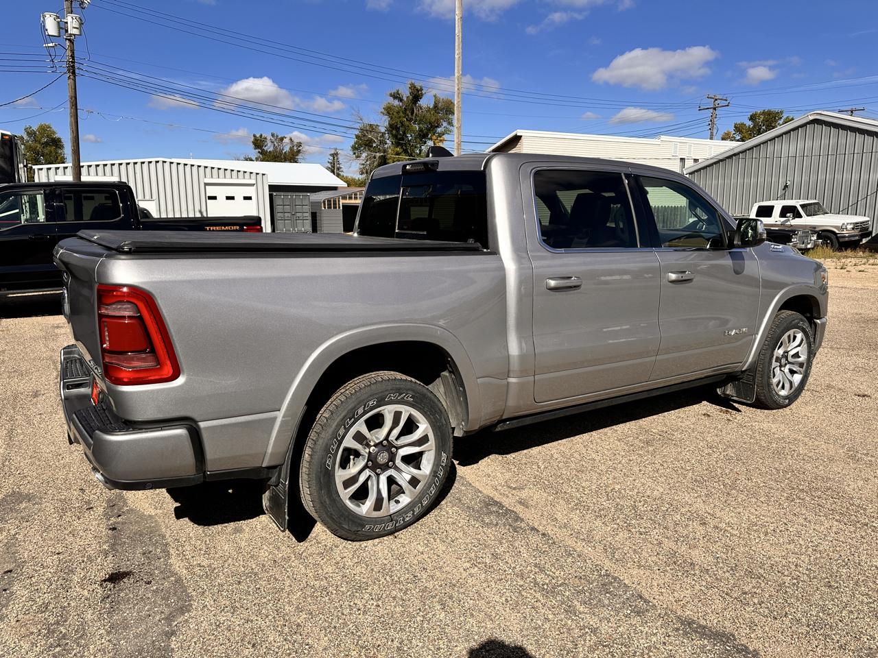 RAM 1500 4WD Crew Cab 149" Laramie Longhorn Edition 2024