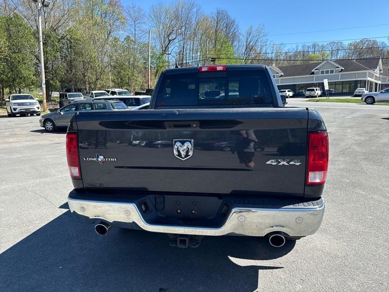 RAM 1500 4WD Quad Cab 140.5" Lone Star 2016