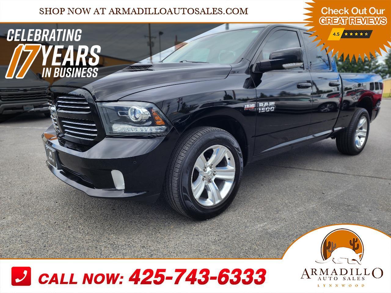 2014 RAM 1500 4WD Quad Cab 140.5" Sport
